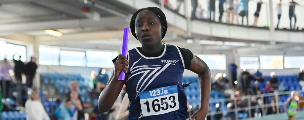 23 March 2024; Sophia Nwaedozie of Belgooly AC, Cork, on her way to winning the under 14 girls 4x200 relay during day one of the 123.ie National Juvenile Indoor Championships at the TUS International Arena in Athlone. Photo by Stephen Marken/Sportsfile
