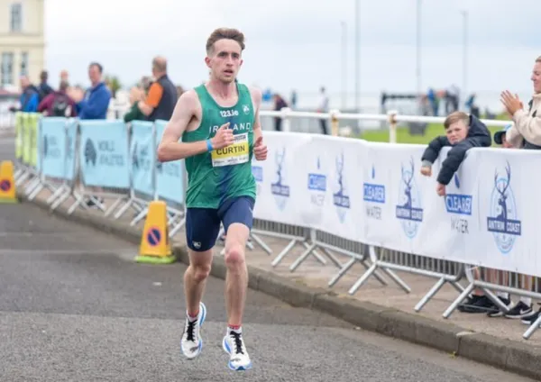 CURTIN TAKES NATIONAL HALF MARATHON RECORD