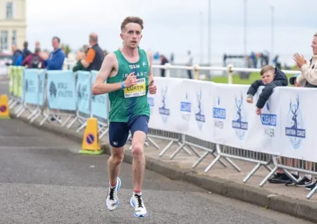 CURTIN TAKES NATIONAL HALF MARATHON RECORD