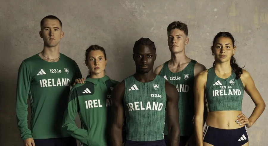 group photo of jack raftery, kate o'connor, israel olatunde, cian mchphillips, and sophie o'sullivan modelling irish kit